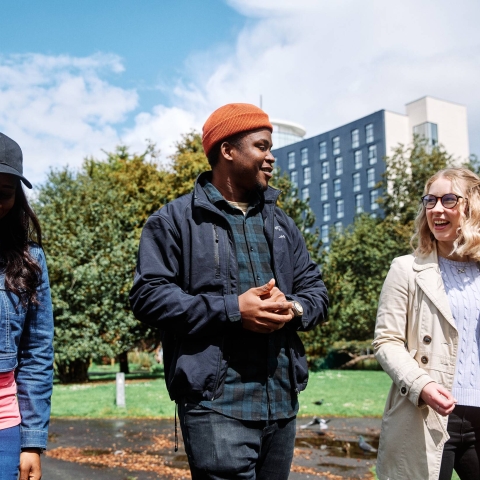 Students walking in park
