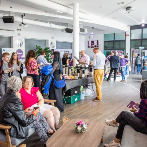 Photo of attendees enjoying refreshments at Student Union
Alumni Weekend