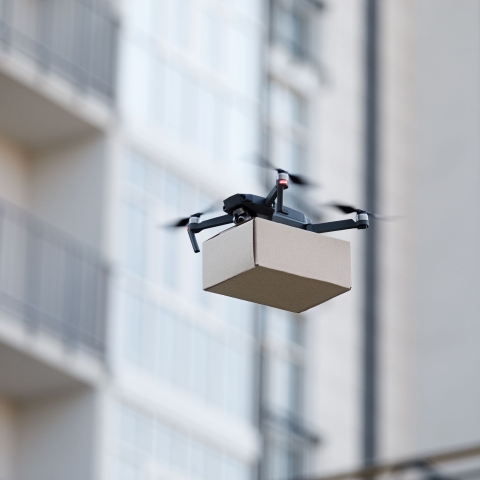 Drone carrying a parcel