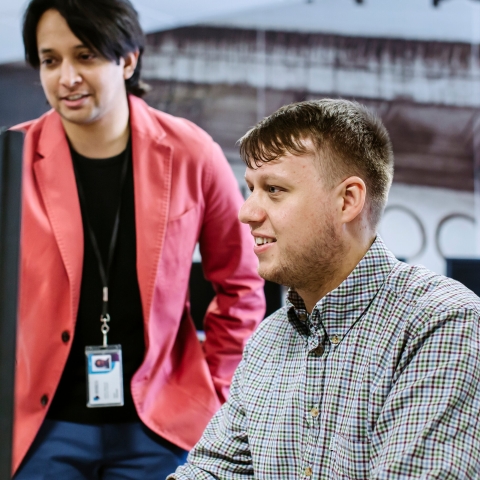 Student using financial software in university's Bloomberg Suite