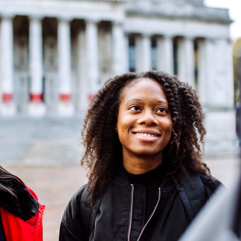 International students smiling outside of Portsmouth Guildhall