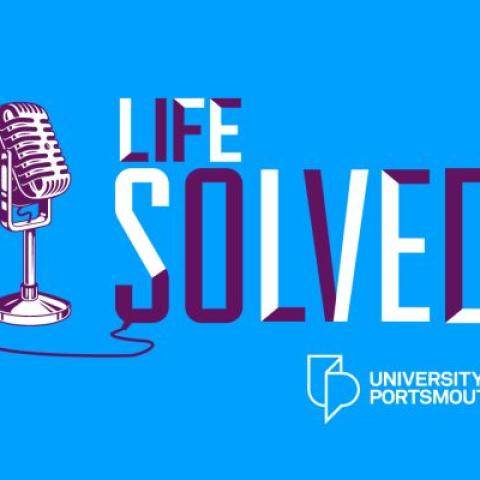 logo illustrated by a microphone connected to the words Life Solved