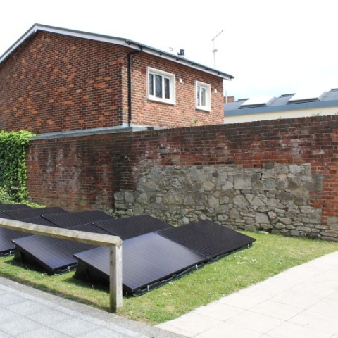 A three-bedroom house on campus with solar panels outside