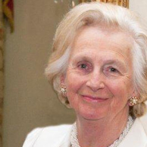 Dame Mary Fagan smiling to camera