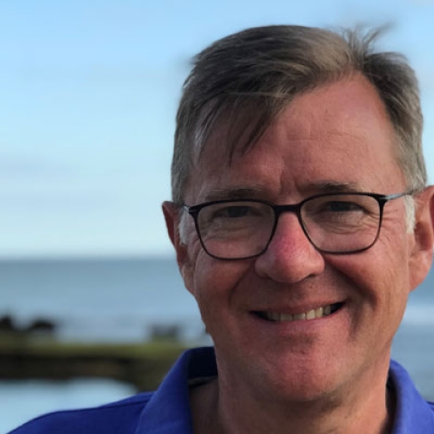 Michael Newey smiling to camera