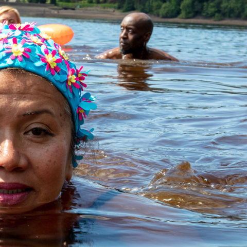 Woman swimming outside