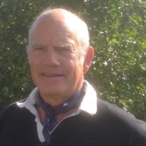 Rob Hutchinson smiling to camera with garden backdrop