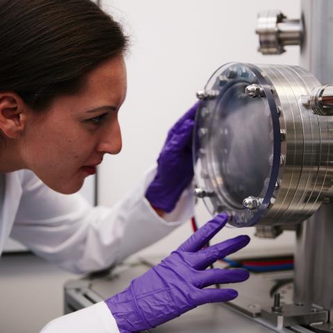 Female physics student in laboratory