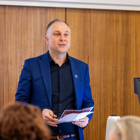 Staff member delivering a talk