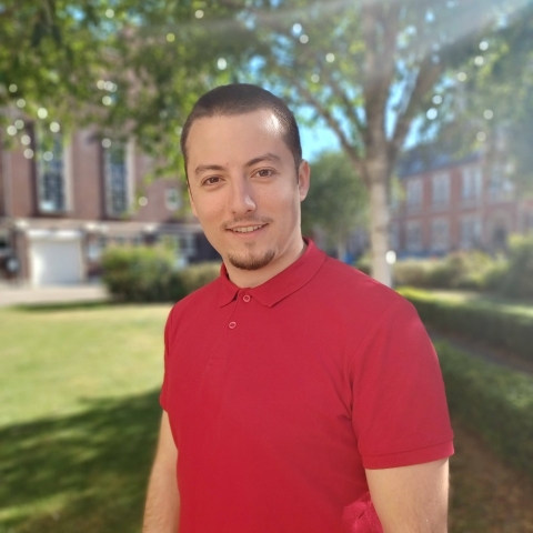 Global Recruitment officer Teddy looking at the camera