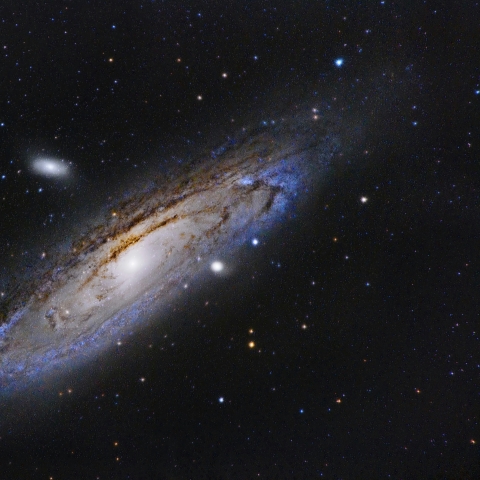 Image of outer space showing darkness, light sources and stars to depict the Universe