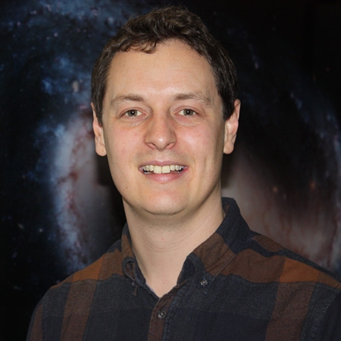 A headshot of Dr Thomas Collett