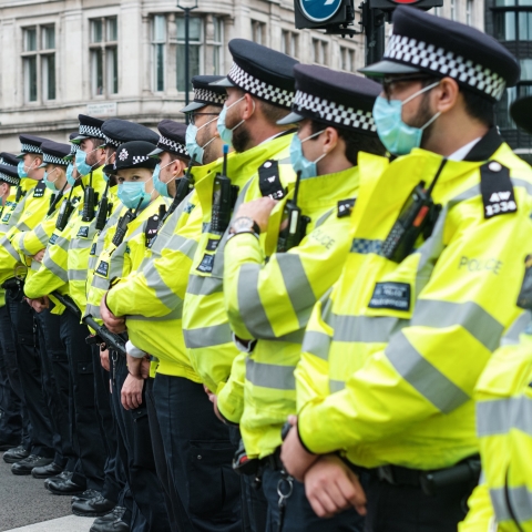 Police officers lined up - Photo by Ehimetalor Akhere Unuabona on Unsplash