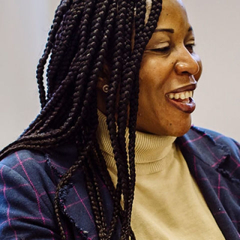 A postgraduate student in a seminar