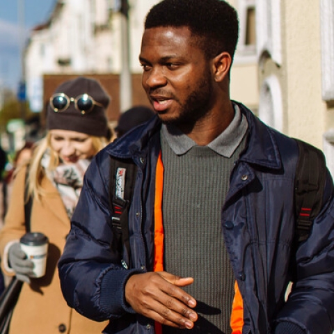 2 male international students chatting in Southsea street