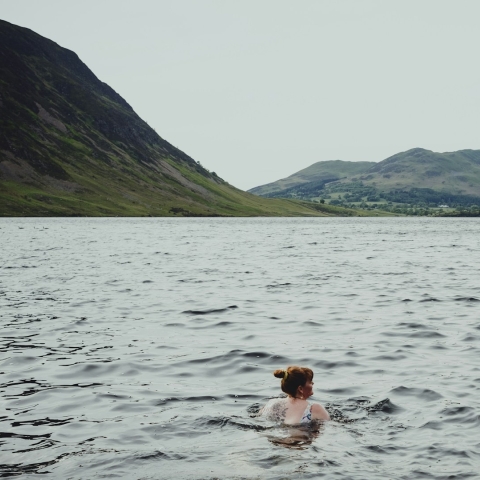 Woman swimming in a lake