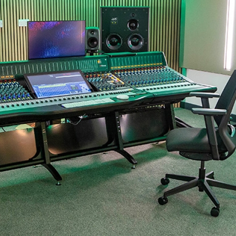 Music studio with lighting and mixing deck