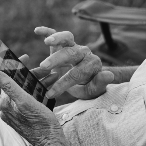 elderly person on phone