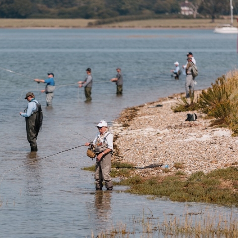 People flyfishing in the solent