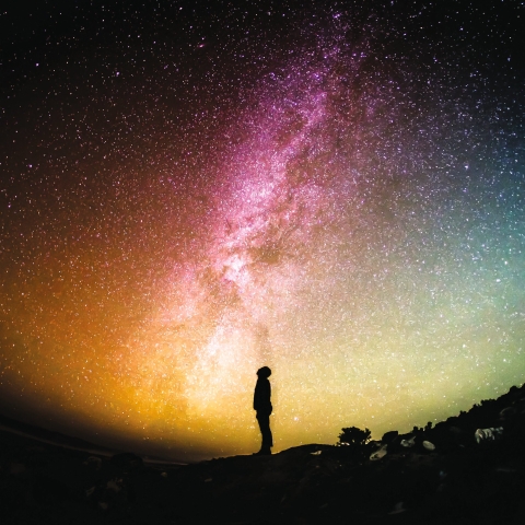 Man stargazing at night silhouette 