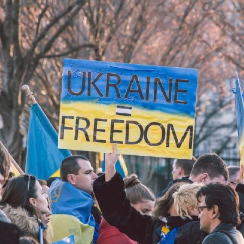 Ukraine war protest sign saying 'Ukraine freedom'.
