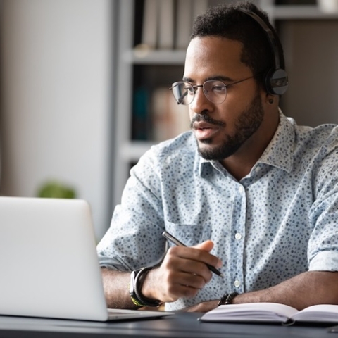 Male working from home with his laptop