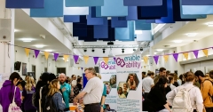 People mingling at the employment and volunteering fair