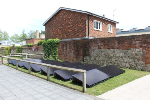 A three-bedroom house on campus with solar panels outside