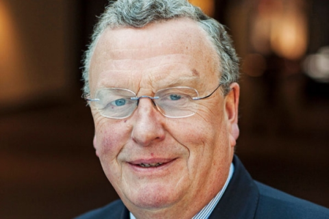 Nairn Wilson smiling to camera in headshot