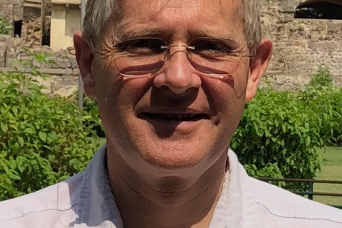 Picture of Peter Neyroud smiling to camera