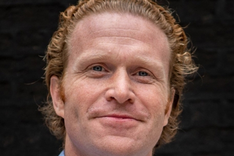 Picture of William de Laszlo smiling to camera