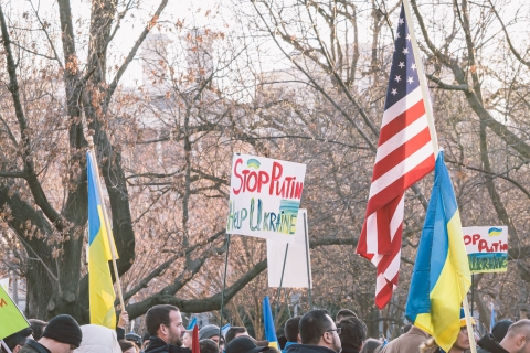 group of people holding American and Ukrainian flag - Photo by Gayatri Malhotra on Unsplash