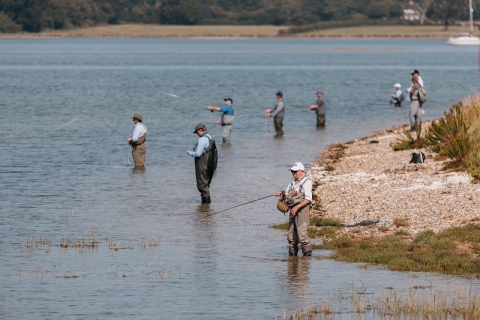 People flyfishing in the solent