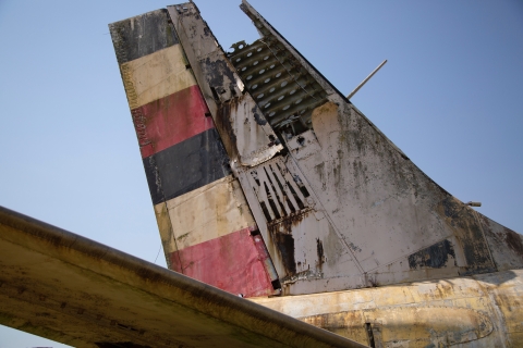 Abandoned airplane with Ugandan's flag - Photo by Sam Balye on Unsplash