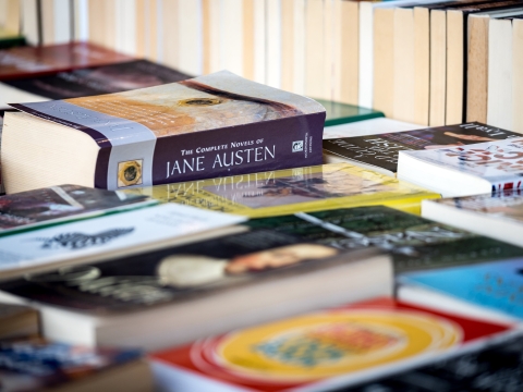 Close-up of paperback books on a table