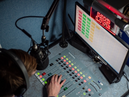 University of Portsmouth student operates a camera mounted on a crane