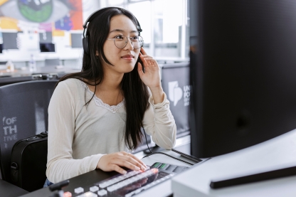 Student using recording equipment in the CCIXR Smart Stage In Eldon.ONLY TO BE USED IN REFERENCE TO CCIXR.