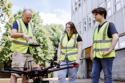 Students receive instruction from drone technician at Technology FacilitiesNote: The drone is only currently operable by technicians.