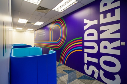 Kaplan study corner with comfy blue seats and desks