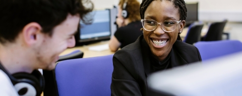 Woman smiling in Language Lab