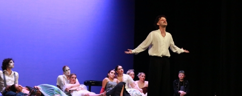 Student performing on stage