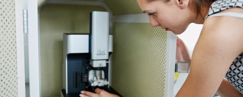 Student working with Atomic Force microscope