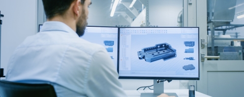 Man using modelling software on a computer