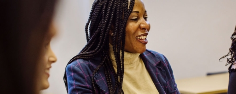 A postgraduate student in a seminar