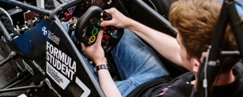 Students working on Formula Student race car