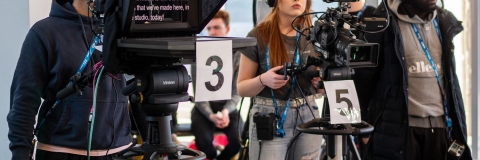 Student film crew producing a show