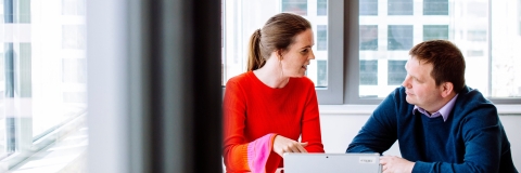 Staff members in a meeting