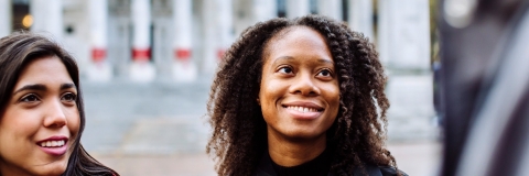 International students smiling outside of Portsmouth Guildhall