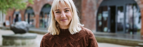 Female student smiling at the camera