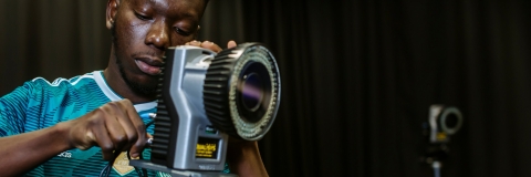 A person using a device with a wide lens